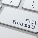 White Keyboard with Sell Yourself Button.