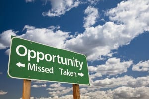 Opportunity Missed and Taken Green Road Sign Over Dramatic Blue